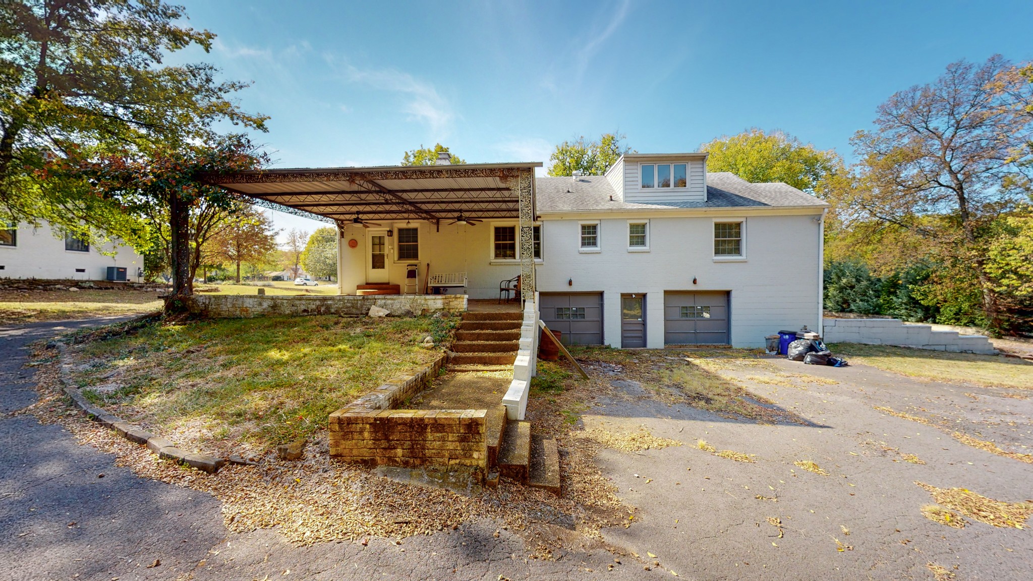 774 Elysian Fields Road Nashville, TN 37204 - Photo 15 of 43 a view of a house with a yard and sitting area