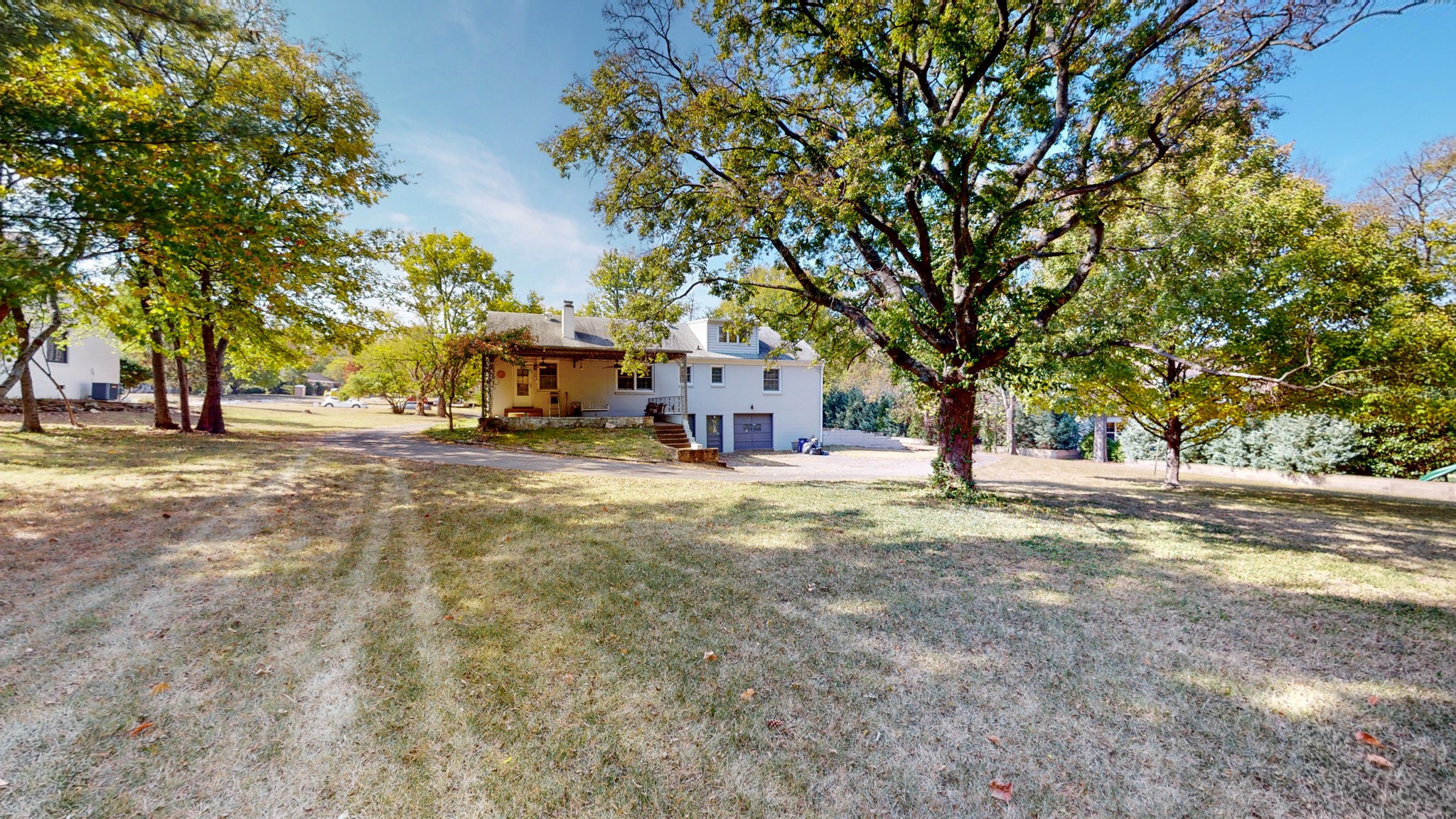 774 Elysian Fields Road Nashville, TN 37204 - Photo 19 of 43 a view of a yard with plants and trees