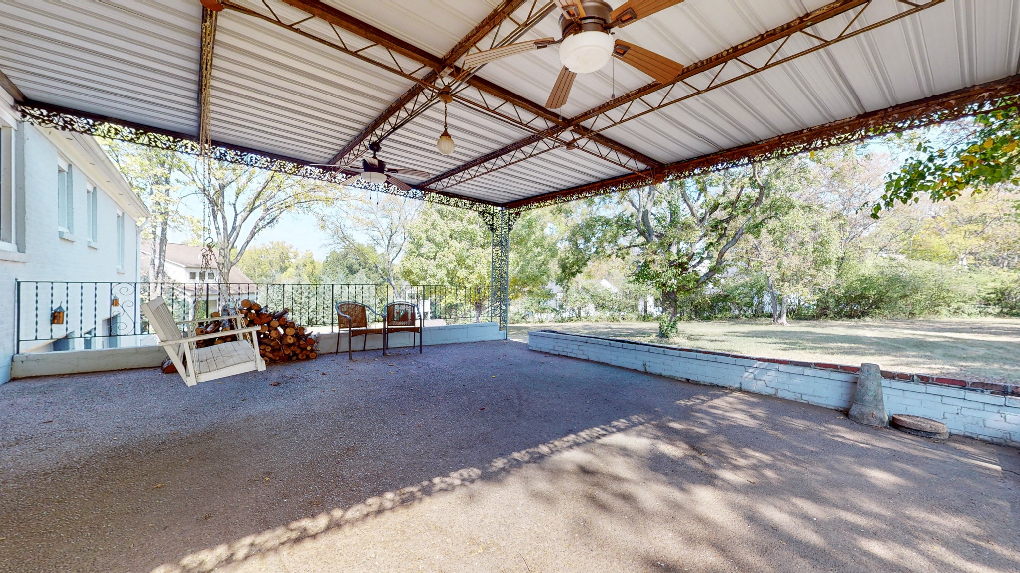 774 Elysian Fields Road Nashville, TN 37204 - Photo 21 of 43 a view of a patio with table and chairs and couches
