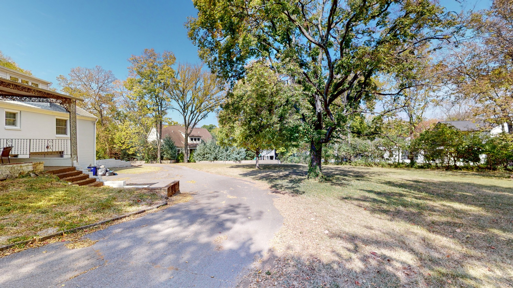 774 Elysian Fields Road Nashville, TN 37204 - Photo 23 of 43 a view of a yard with plants and trees