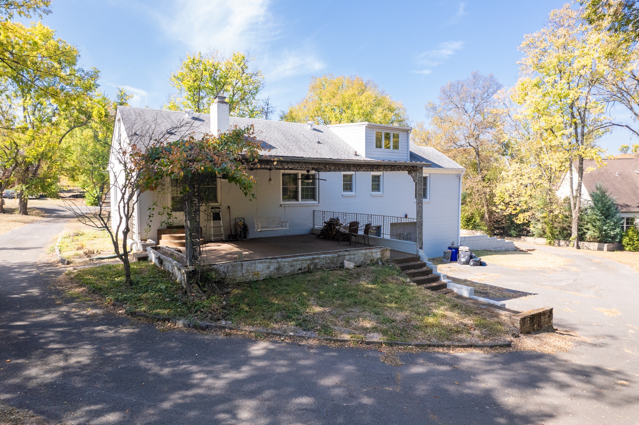 774 Elysian Fields Road Nashville, TN 37204 - Photo 24 of 43 a view of a house with backyard and sitting area