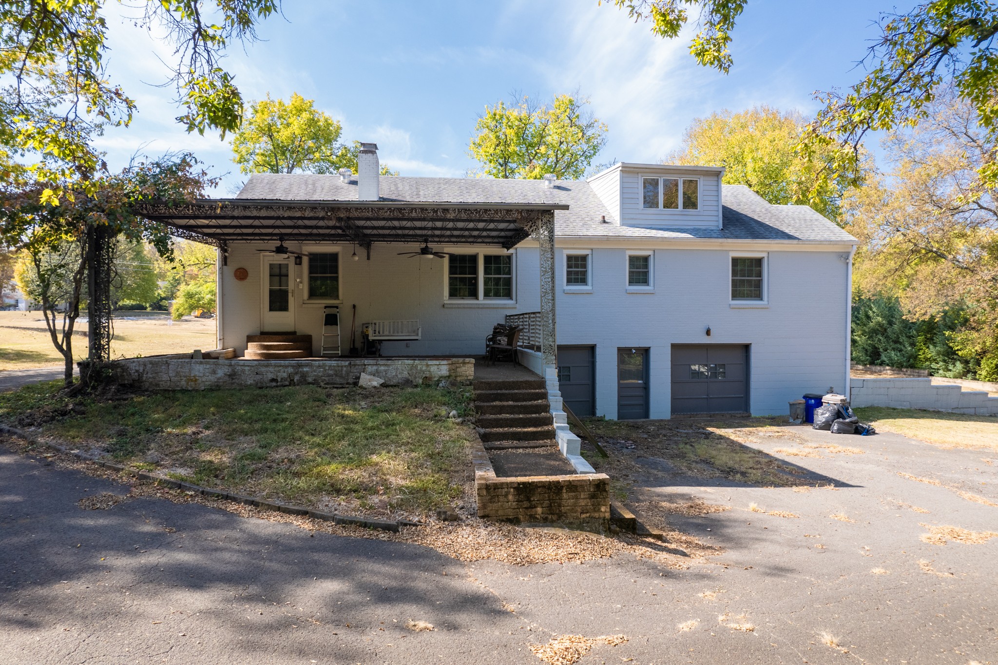 774 Elysian Fields Road Nashville, TN 37204 - Photo 25 of 43 a front view of a house with garden