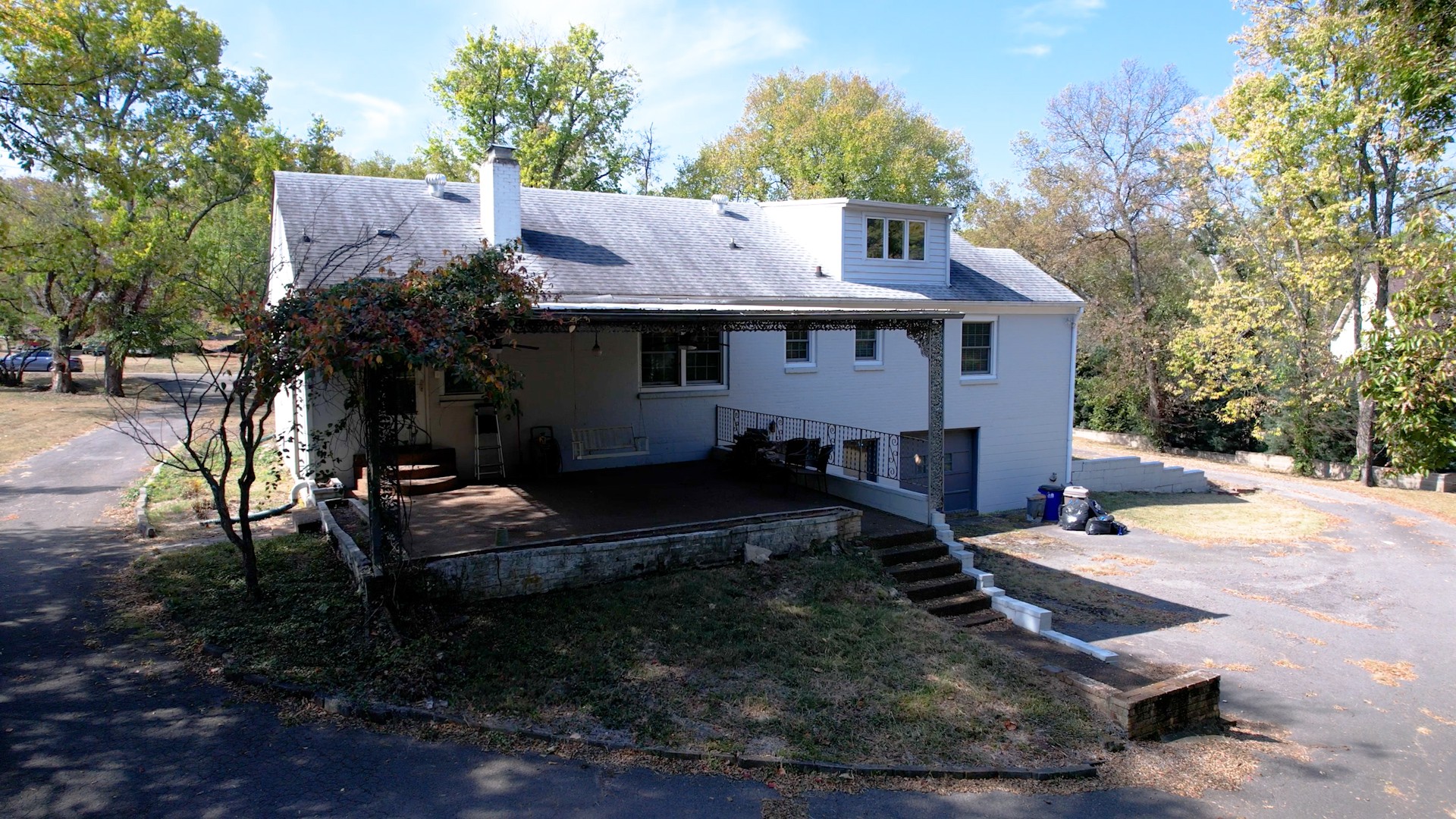 774 Elysian Fields Road Nashville, TN 37204 - Photo 32 of 43 a view of a house with backyard and sitting area