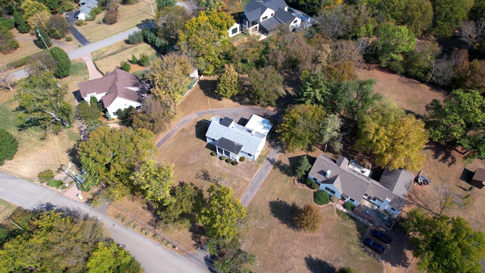 774 Elysian Fields Road Nashville, TN 37204 - Photo 37 of 43 an aerial view of a house with a yard and lake view