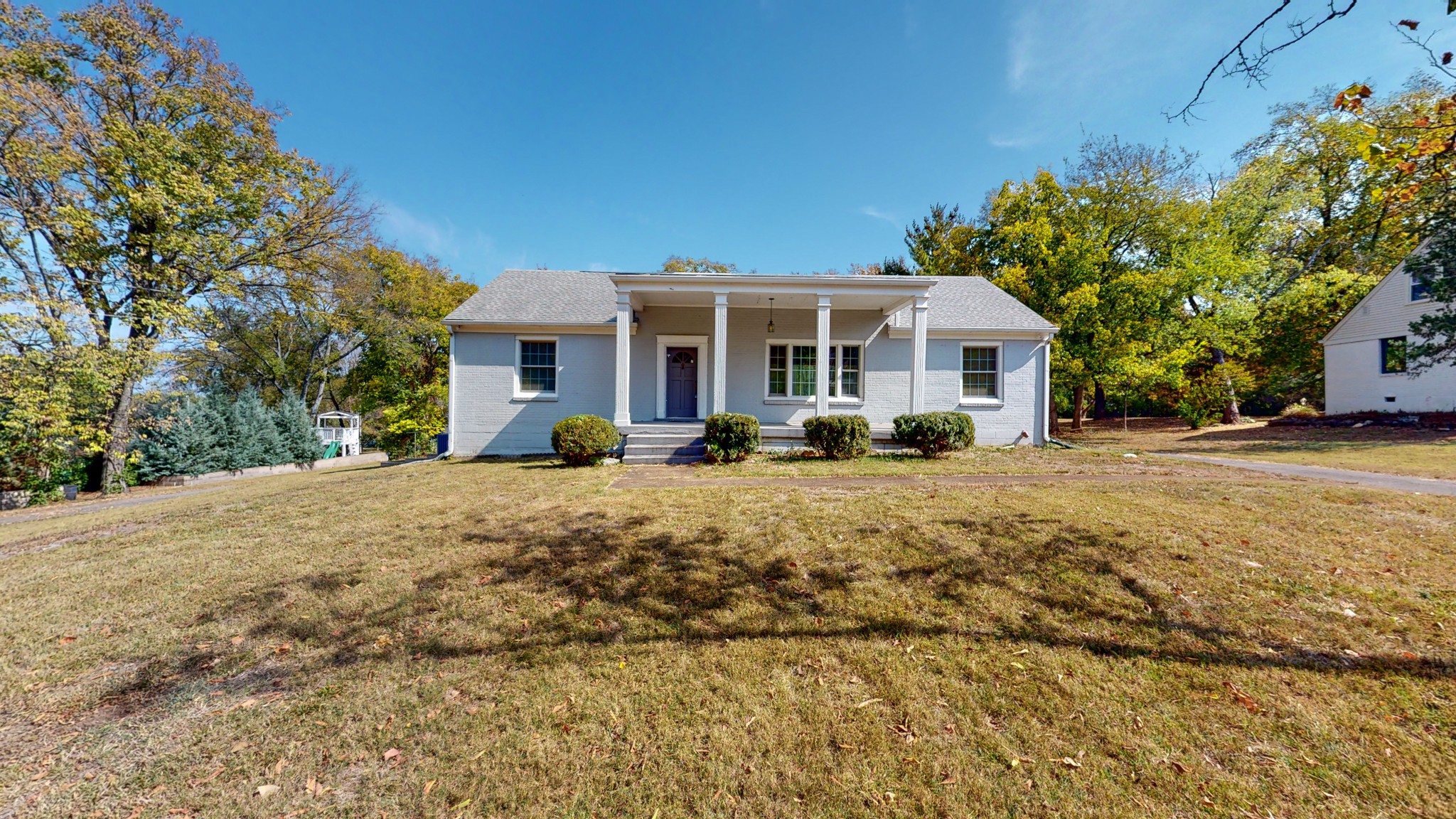 774 Elysian Fields Road Nashville, TN 37204 - Photo 10 of 43 a front view of a house with a yard