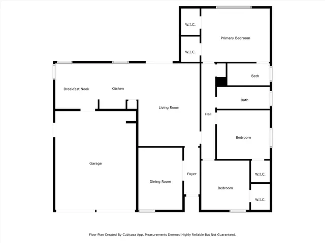 a picture of a room with a white wall and white cabinet