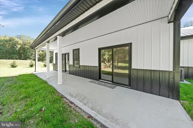 a view of a porch with a backyard