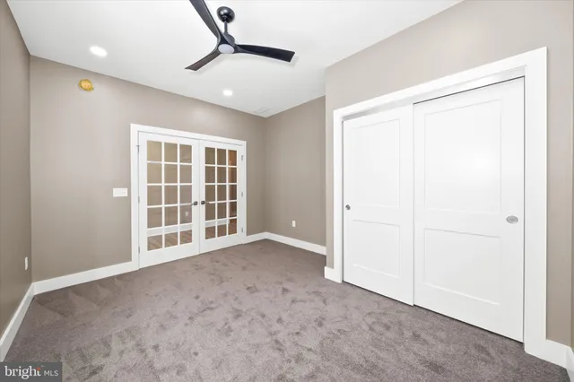 an empty room with windows