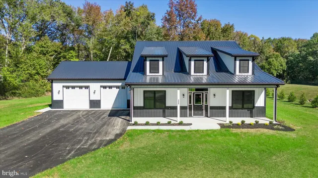 a house view with a garden space