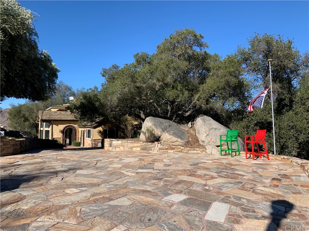 43050 De Portola Road Temecula, CA 92592 - Photo 1 of 1 a view of a white house with a snow in the yard