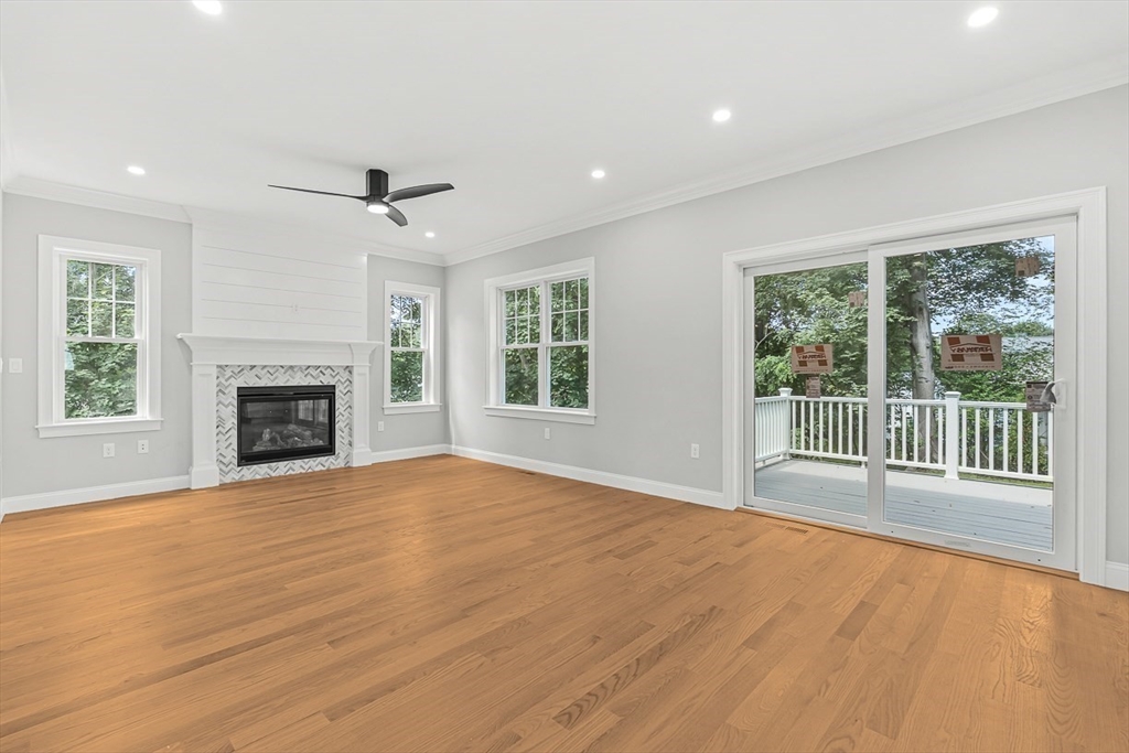 26 Flagg Street Woburn, MA 01801 - Photo 16 of 41 a view of an empty room with wooden floor and a window