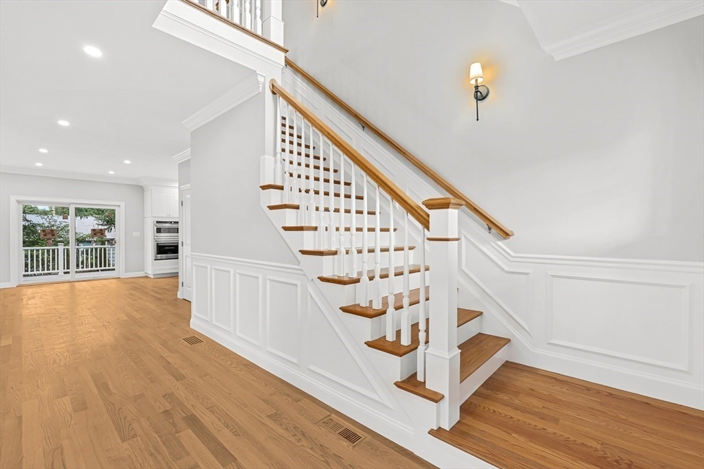 26 Flagg Street Woburn, MA 01801 - Photo 7 of 41 a view of an entryway with wooden floor
