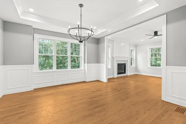 a view of a kitchen with a stove cabinets and wooden floor