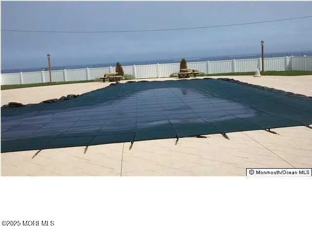 a black and white photo of a living room