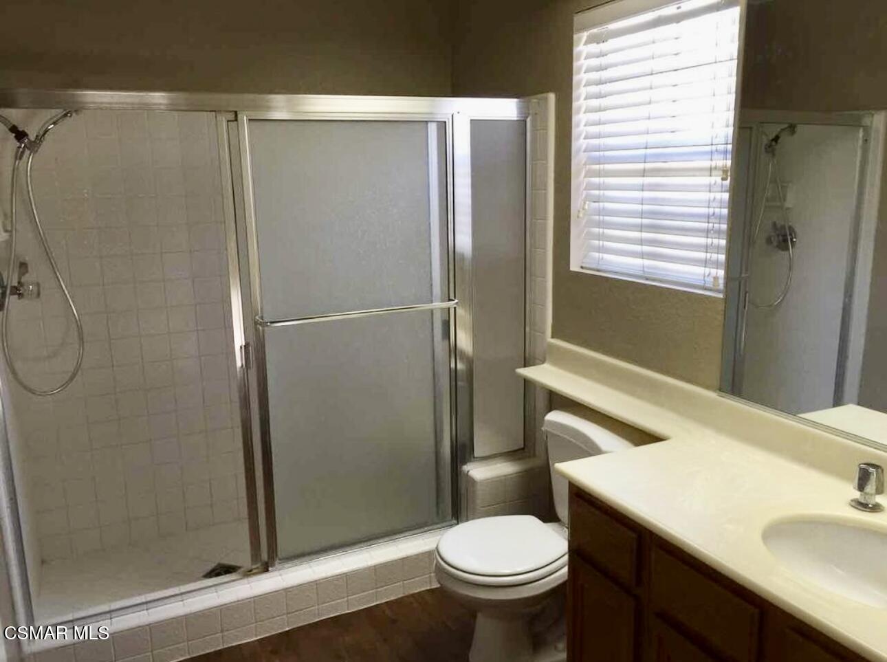 634 Llanerch Lane Simi Valley, CA 93065 - Photo 9 of 9 a bathroom with a sink toilet and shower