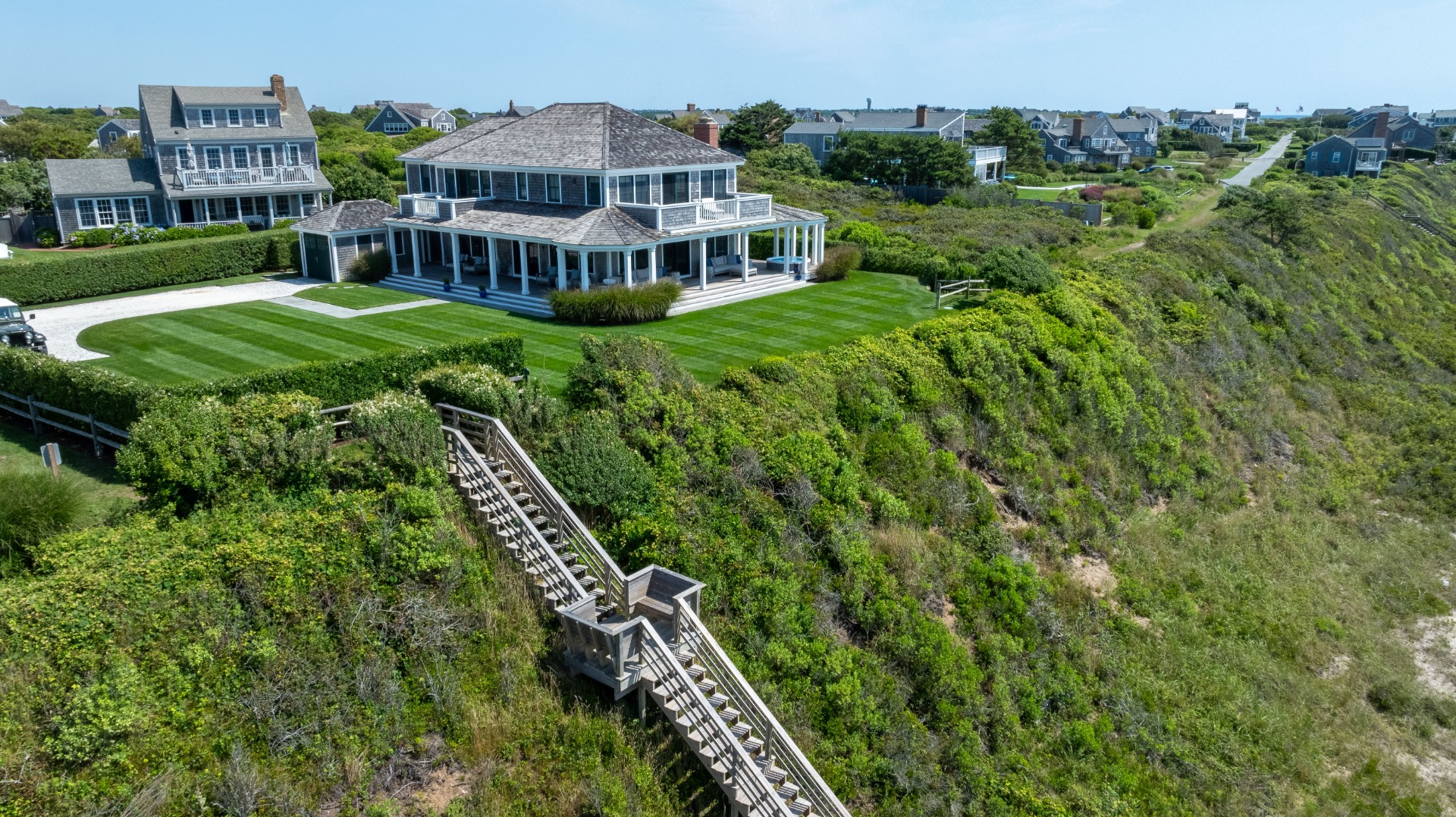 34 Bosworth Road Nantucket, MA 02554 - Photo 8 of 38 an aerial view of residential houses with outdoor space and trees