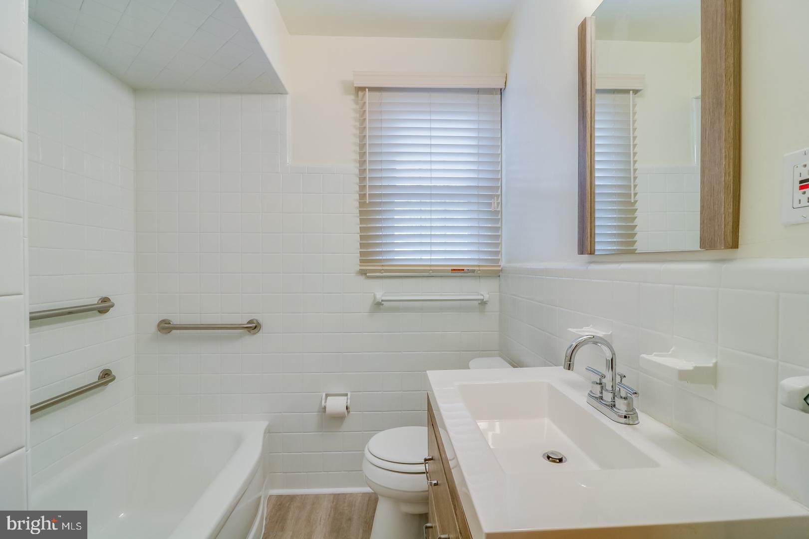 32 Paschall Road Wilmington, DE 19803 - Photo 19 of 21 Updated Hall Bath- Cabinet Sink & Tub Shower Combo