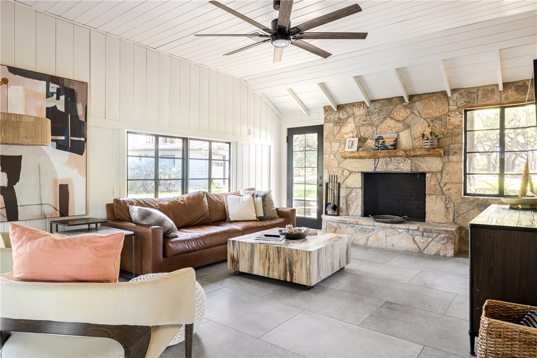 710 Flite Acres Road Wimberley, TX 78676 - Photo 9 of 40 One of several living areas. Cozy fireplace, ground floor.