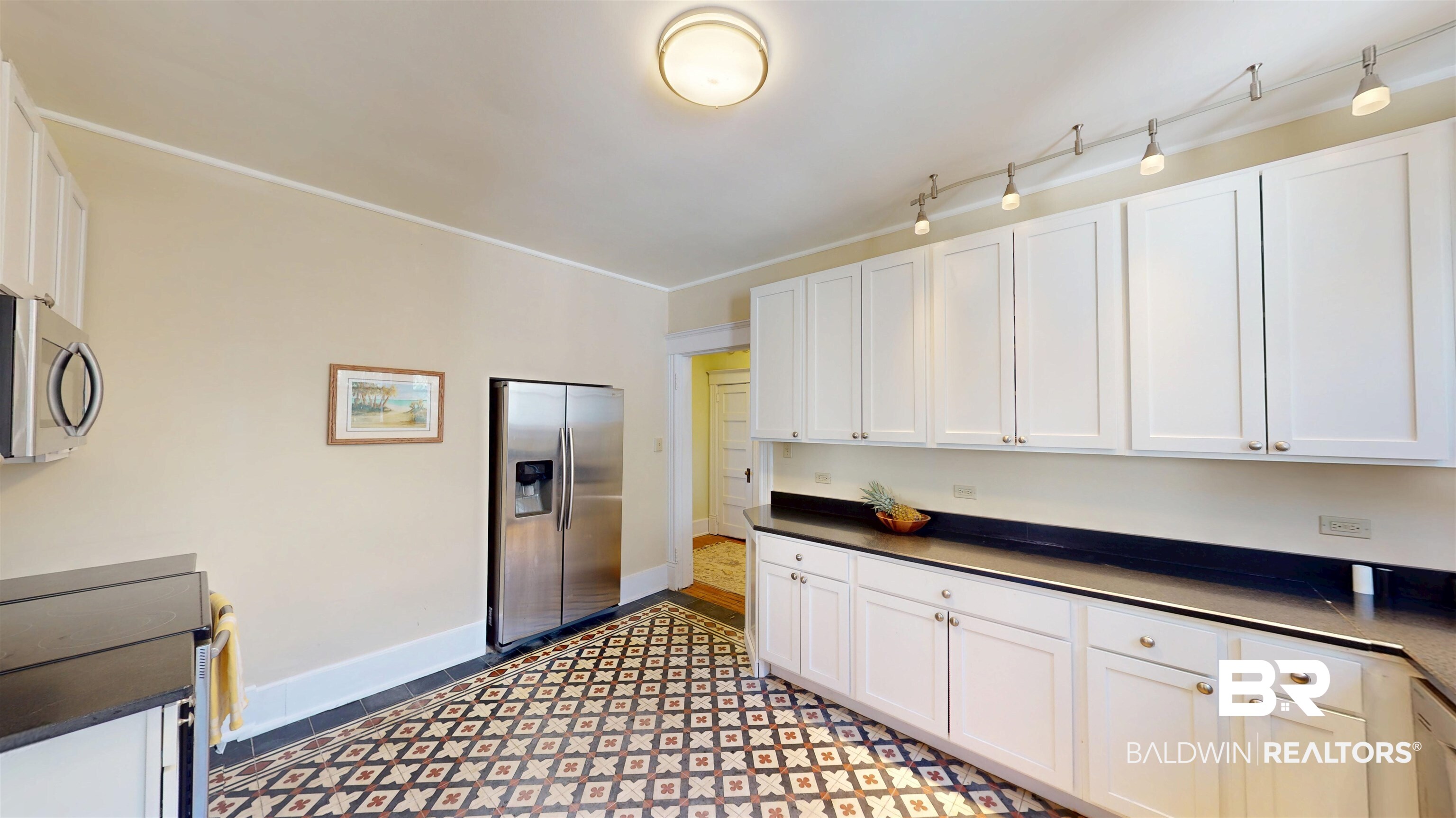 3220 Bayfront Road Mobile, AL 36605 - Photo 14 of 43 Kitchen with white cabinets and stainless steel appliances