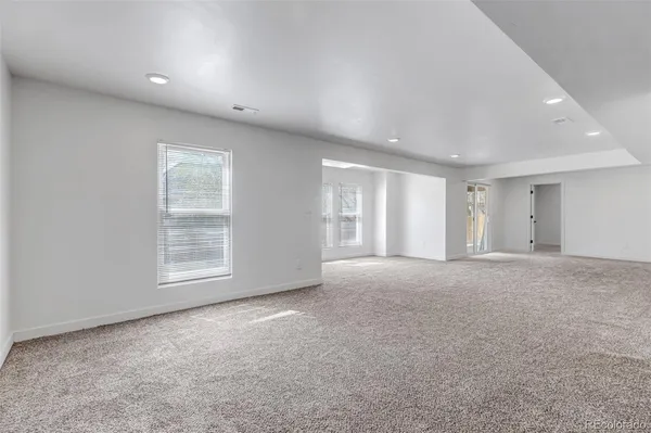an empty room with windows