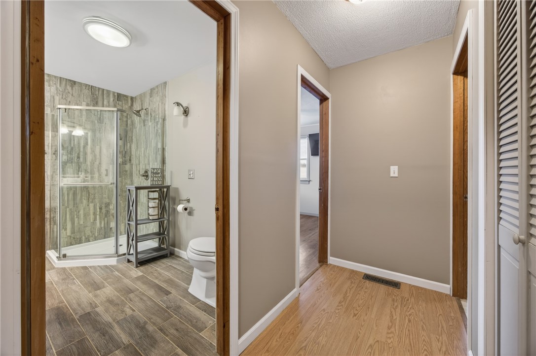 2983 Wood Road Milo, NY 14842 - Photo 27 of 48 Full bathroom on Main floor, next to two bedrooms.