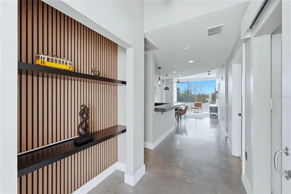 a view of a living room with a large window