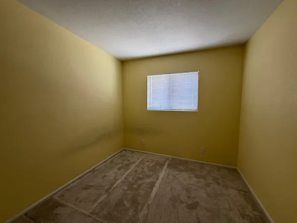 an empty room with a natural light