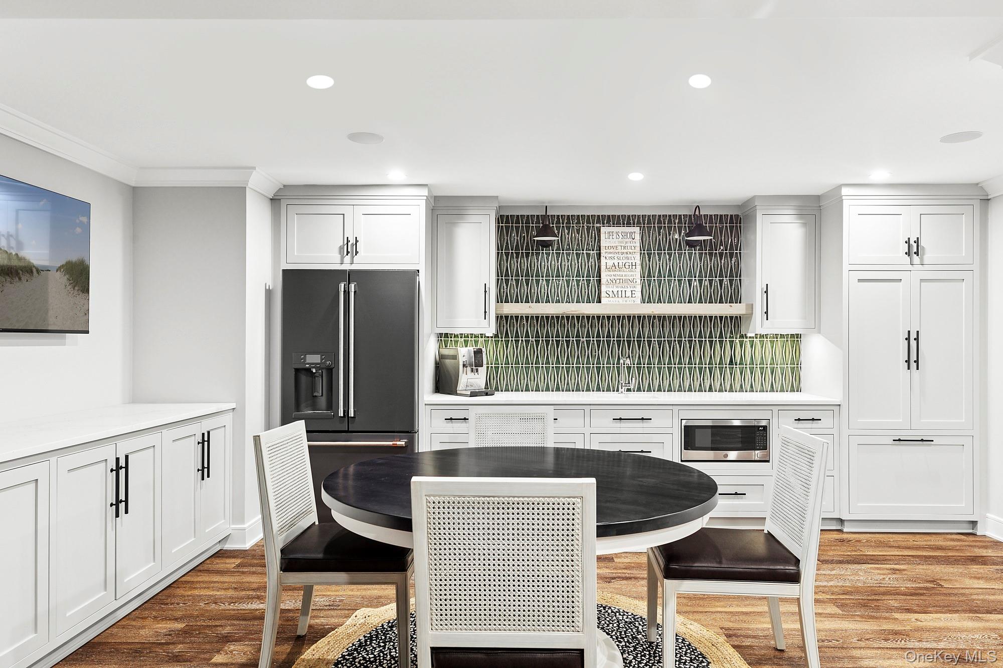 89 Pound Hollow Road Glen Head, NY 11545 - Photo 23 of 26 a kitchen with a sink cabinets and window