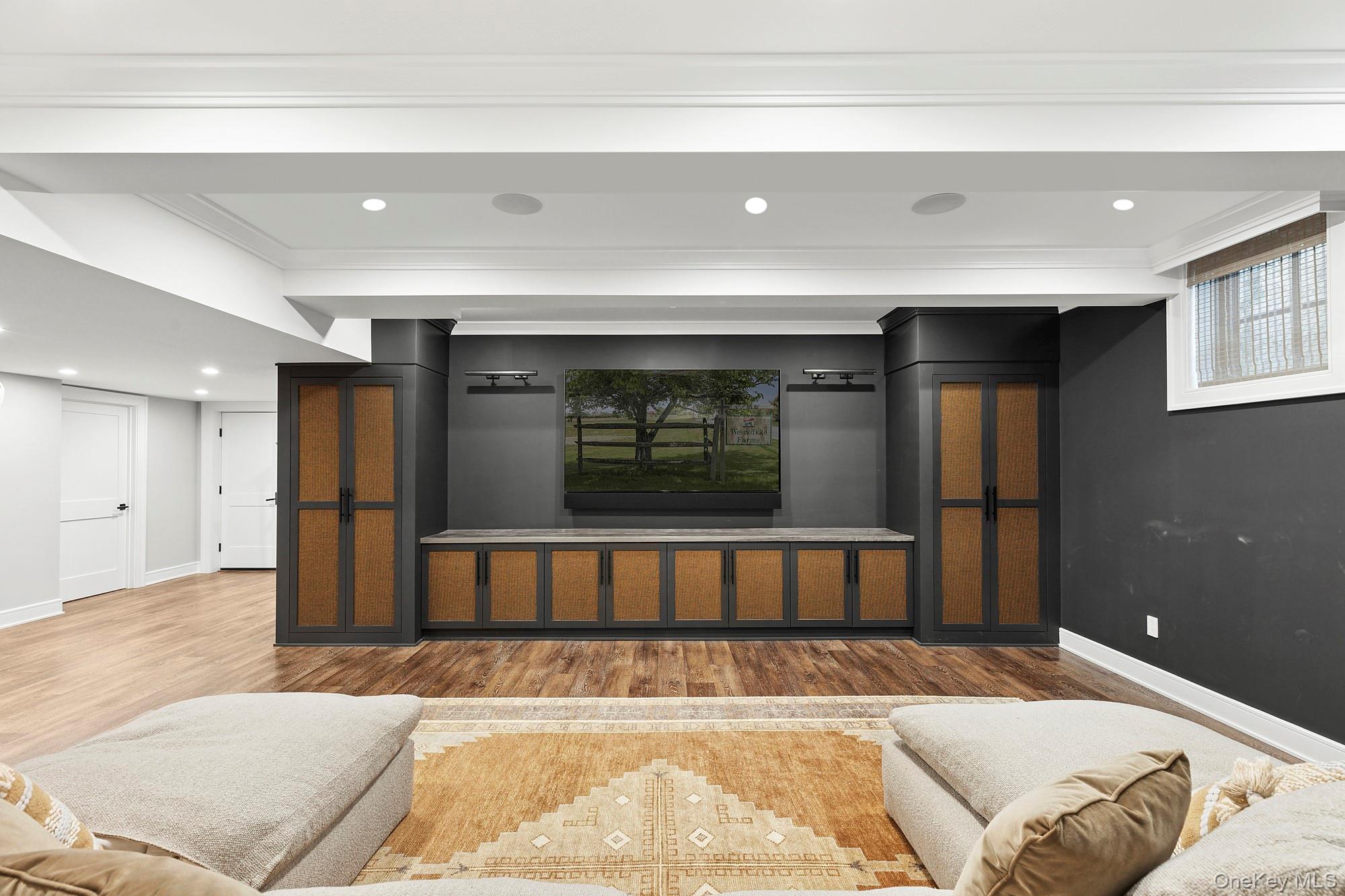 89 Pound Hollow Road Glen Head, NY 11545 - Photo 24 of 26 a bed sitting in a room next to a window