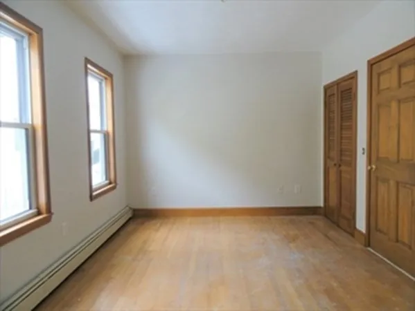 an empty room with windows