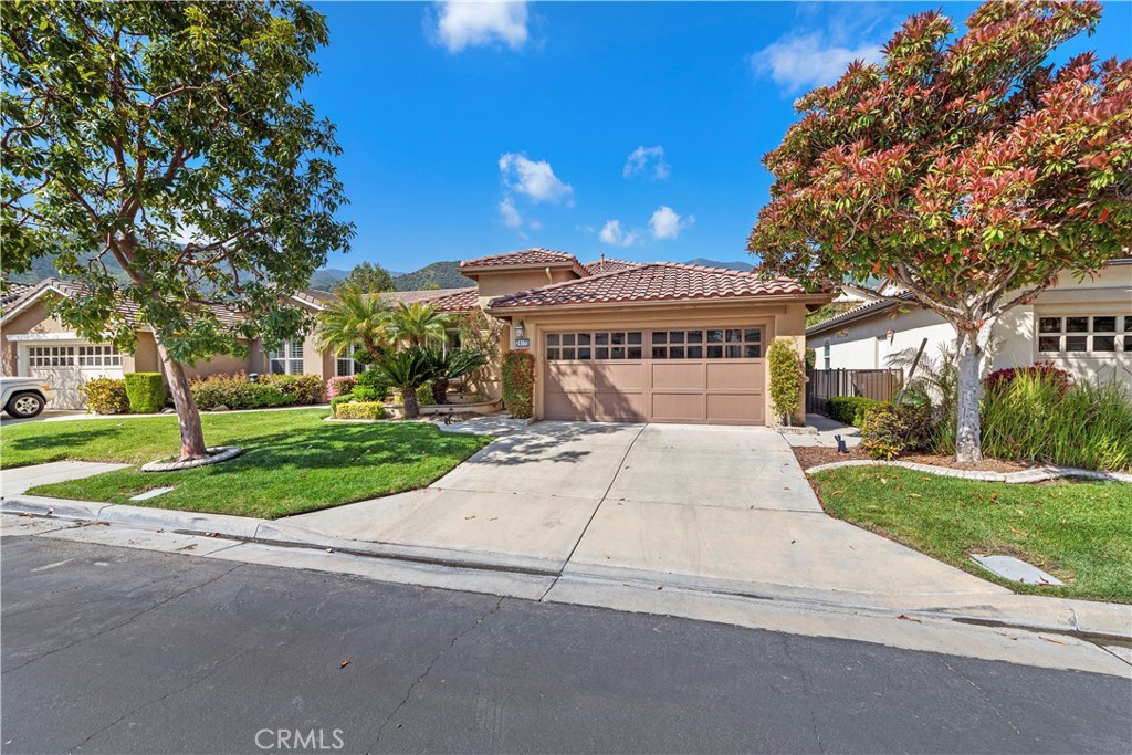 24575 Lowe Drive Corona, CA 92883 - Photo 2 of 44 a view of a house with a yard