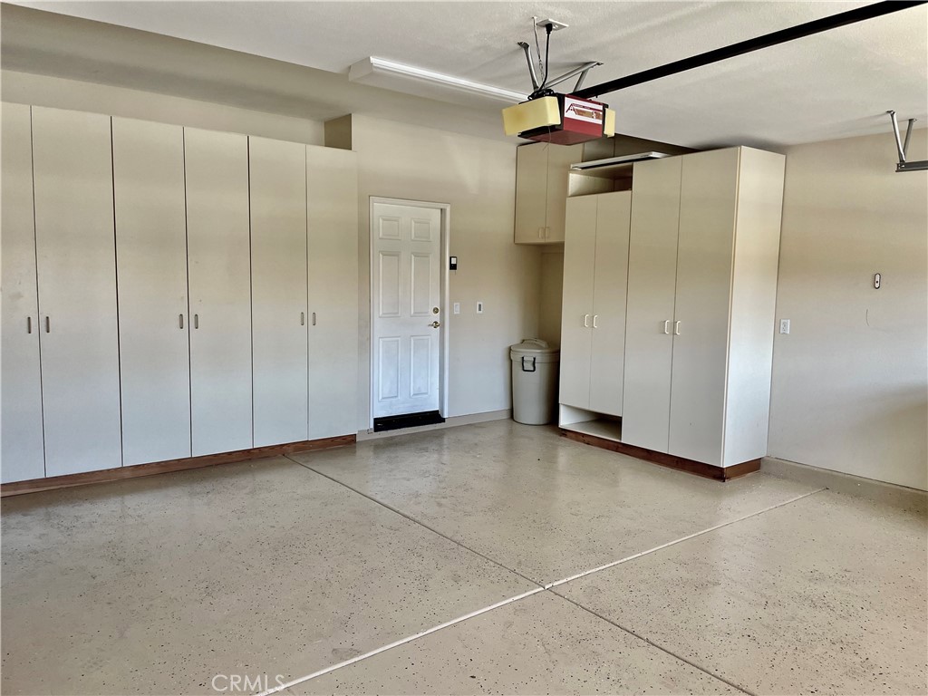 24575 Lowe Drive Corona, CA 92883 - Photo 20 of 44 a view of a bathroom with a shower and a sink