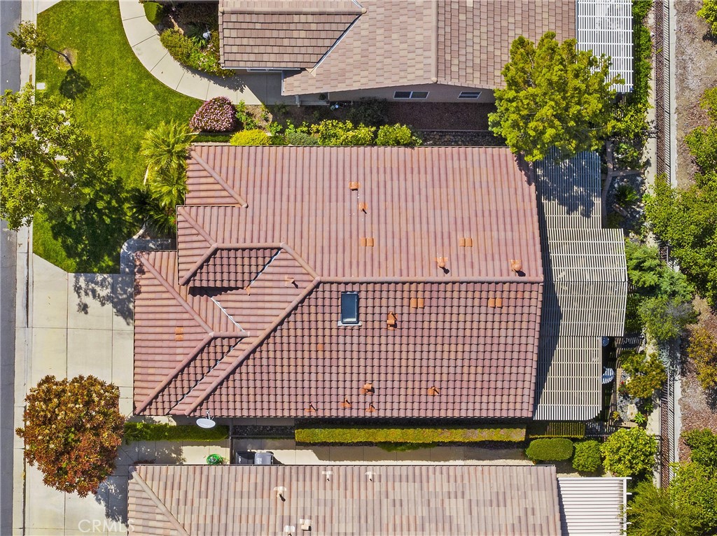 24575 Lowe Drive Corona, CA 92883 - Photo 21 of 44 a backyard of a house with lots of green space