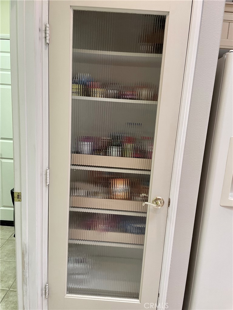 24575 Lowe Drive Corona, CA 92883 - Photo 7 of 44 a view of walk in closet with empty racks
