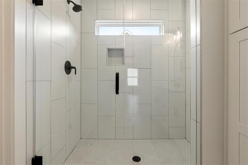 131 Old Alabama Road Southeast Emerson, GA 30137 - Photo 26 of 44 a bathroom with a glass shower door