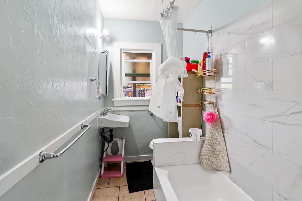 1205 Grand Avenue Santa Rosa, CA 95404 - Photo 14 of 27 a bathroom with a sink and a mirror
