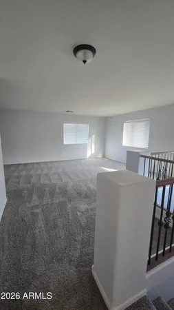 a view of livingroom with hardwood floor and window