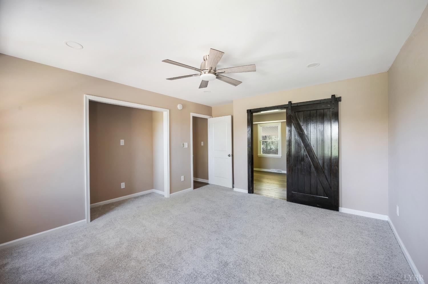 4070 Cottontown Road Forest, VA 24551 - Photo 19 of 38 a view of a big room with closet and windows