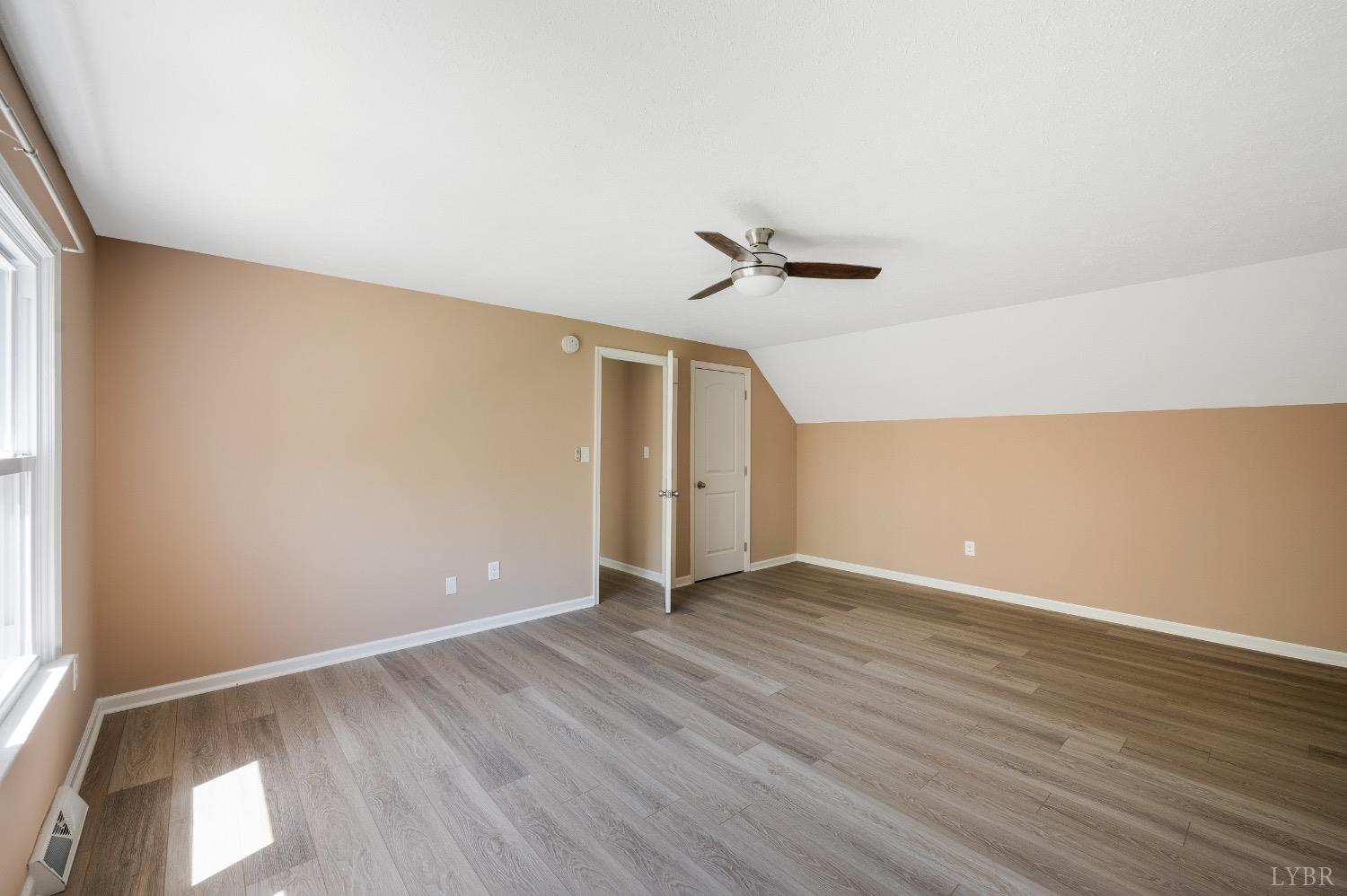 4070 Cottontown Road Forest, VA 24551 - Photo 26 of 38 wooden floor in an empty room with a window