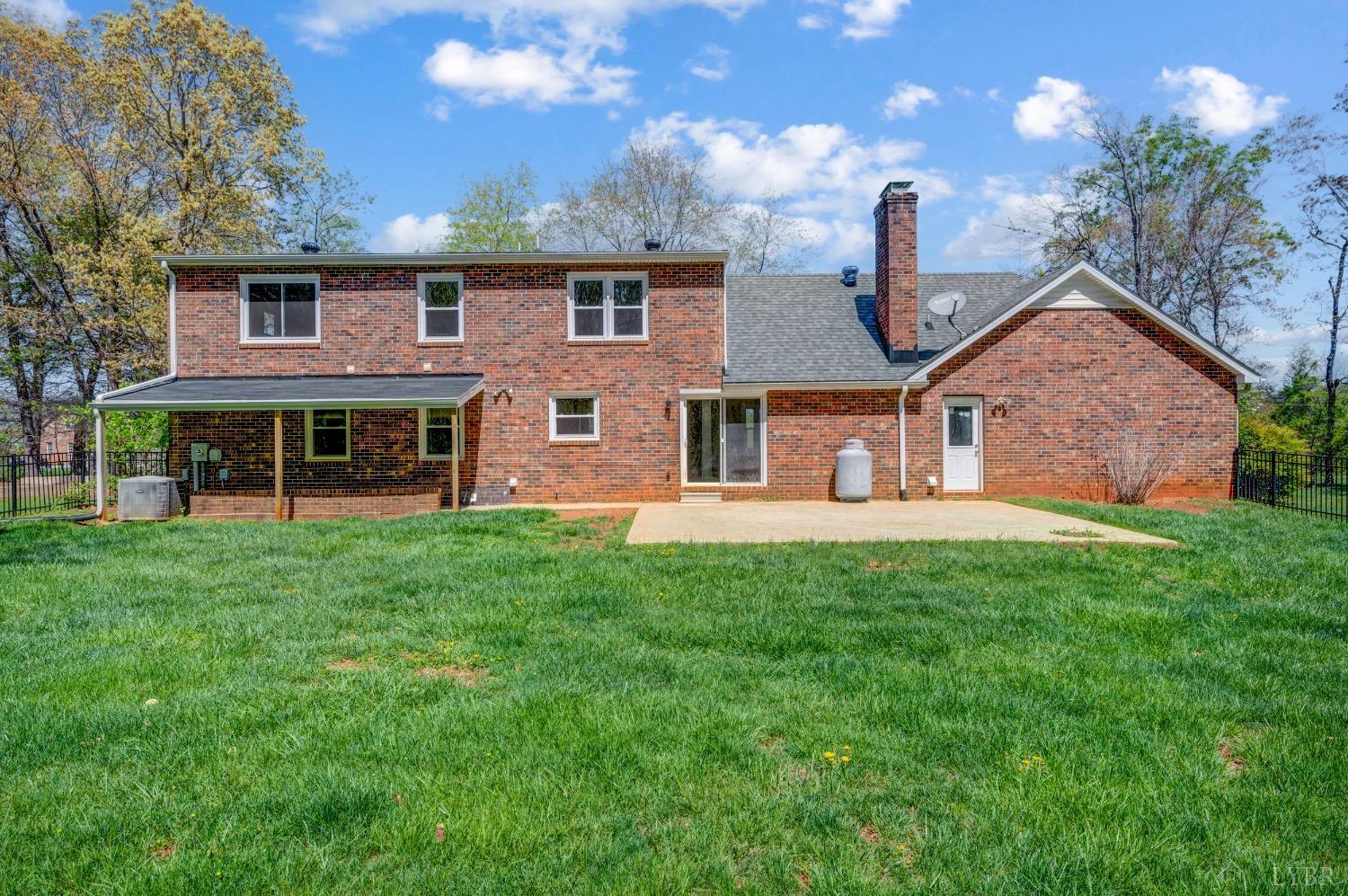 4070 Cottontown Road Forest, VA 24551 - Photo 33 of 38 a front view of a house with a yard