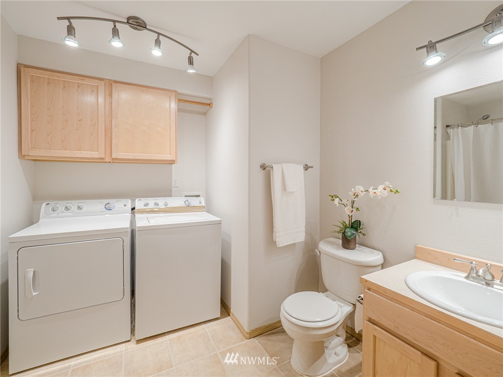 1307 196th Place Southeast Bothell, WA 98012 - Photo 20 of 25 a view of bathroom with a sink and a toilet