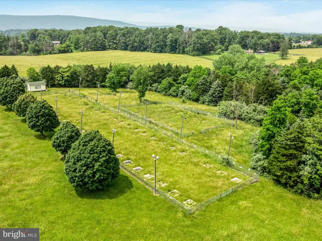 a view of a swimming pool with a lake view