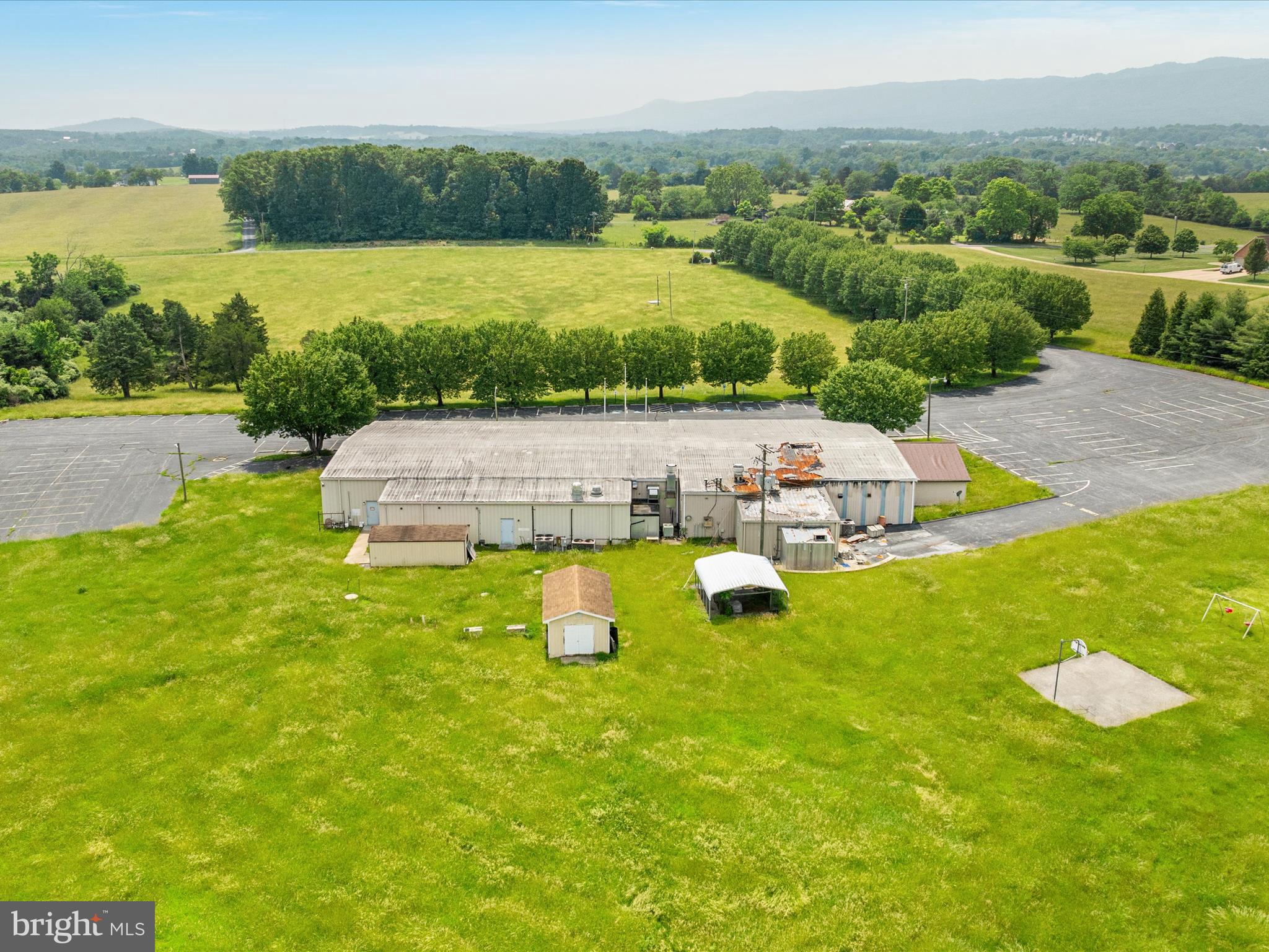 572 Red Bud Road Strasburg, VA 22657 - Photo 8 of 18 a view of a house with pool and a yard