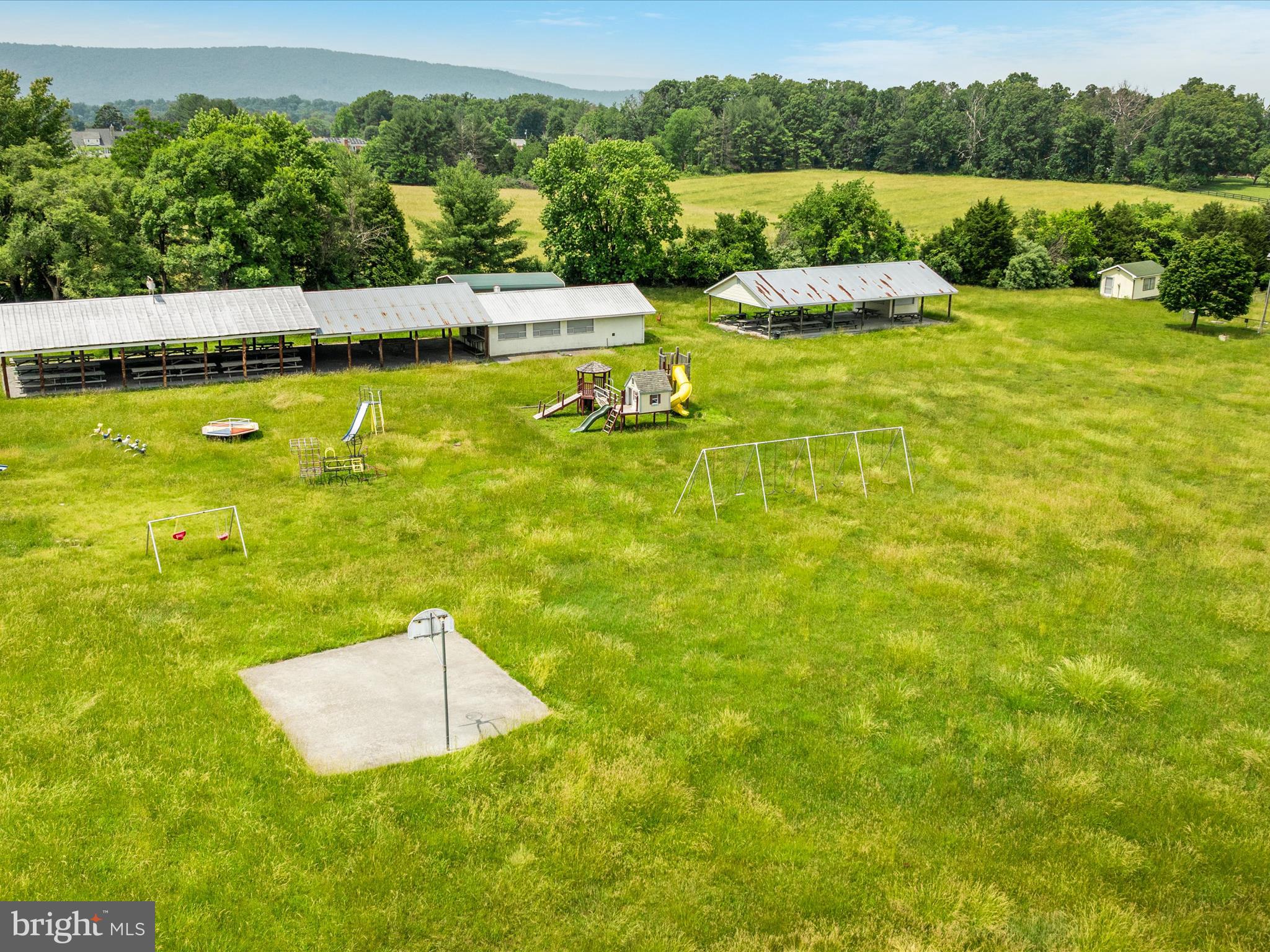 572 Red Bud Road Strasburg, VA 22657 - Photo 9 of 18 a view of a swimming pool with a lake view
