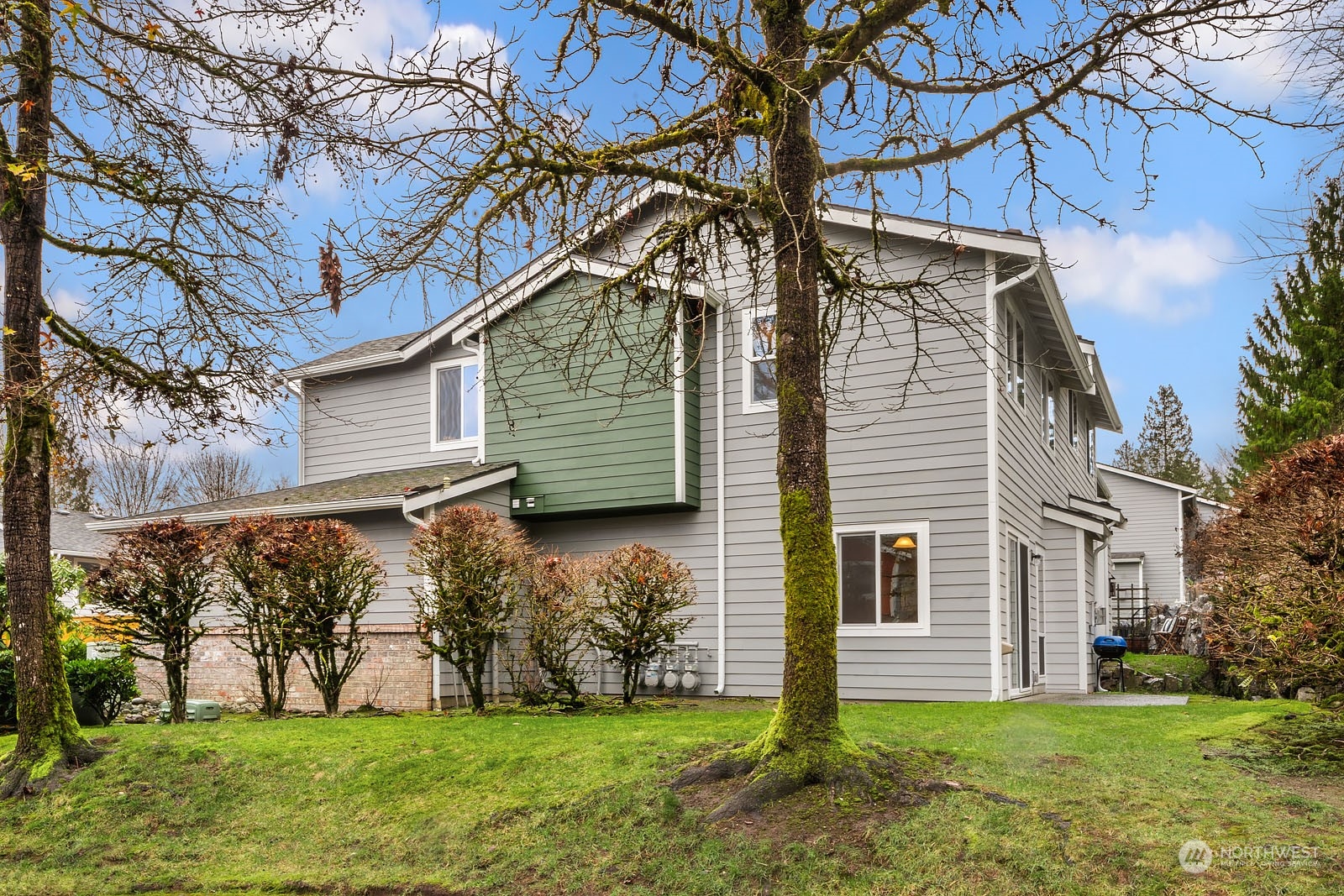 23111 15th Avenue Southeast, Unit E4 Bothell, WA 98021 - Photo 22 of 31 a view of a house with a yard