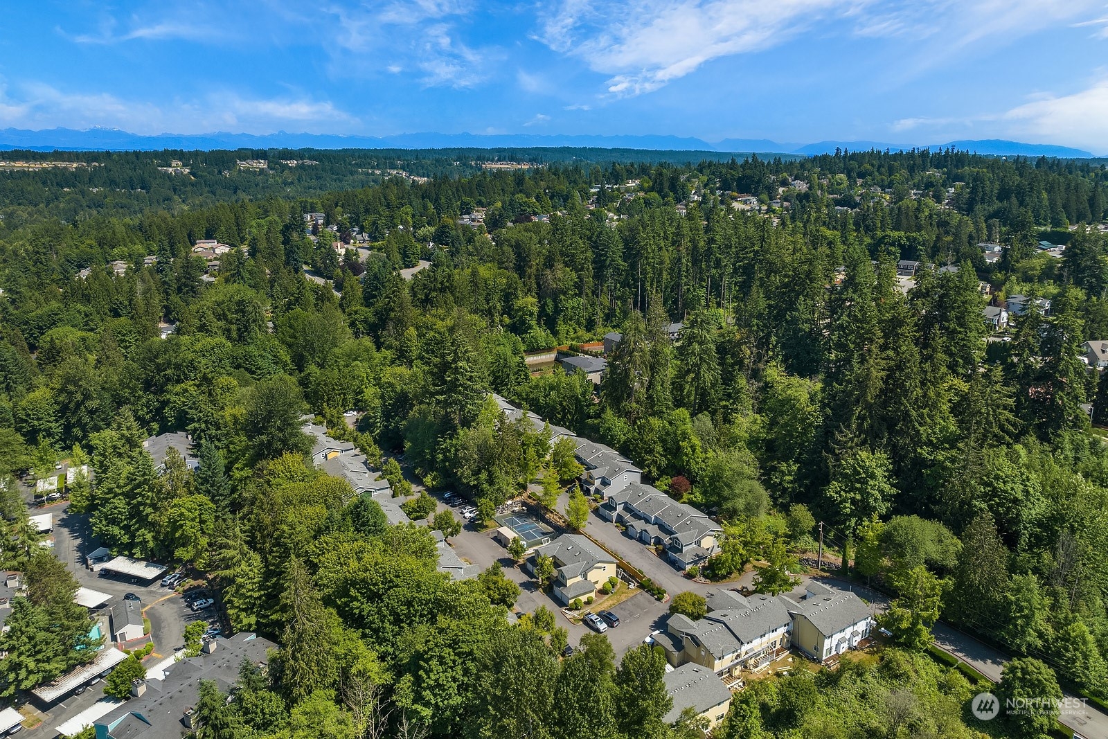 23111 15th Avenue Southeast, Unit E4 Bothell, WA 98021 - Photo 31 of 31 a view of a city with lush green forest