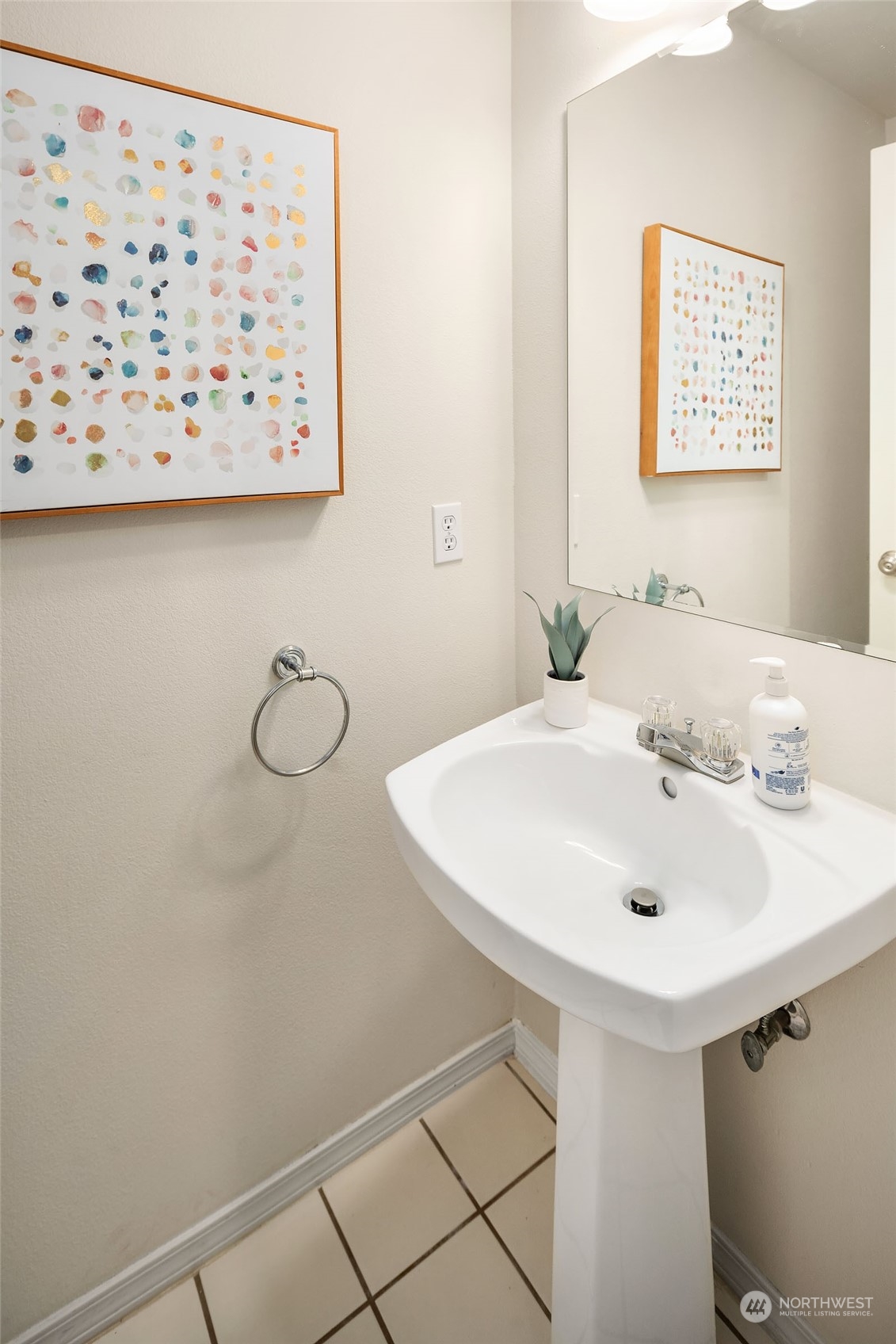 23111 15th Avenue Southeast, Unit E4 Bothell, WA 98021 - Photo 4 of 31 a bathroom with a sink and a mirror