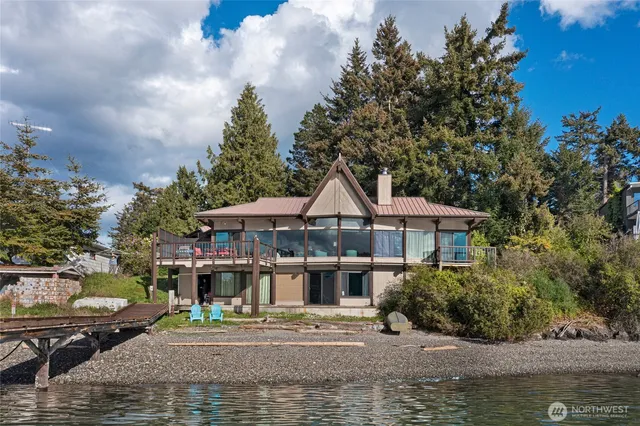 a front view of a house with a boat