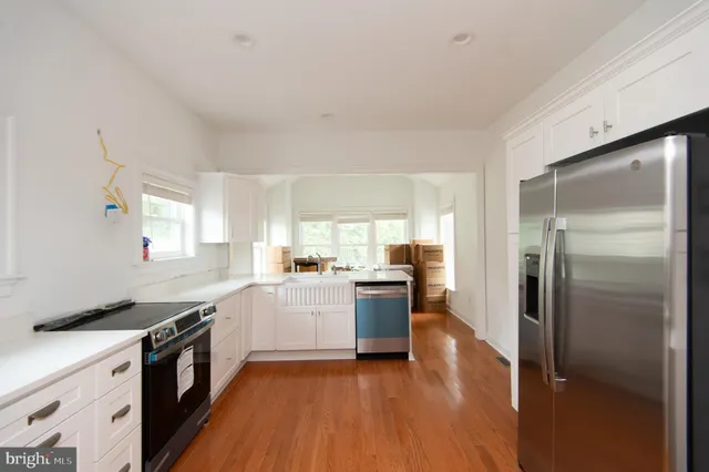 a view of a livingroom with furniture and a fireplace