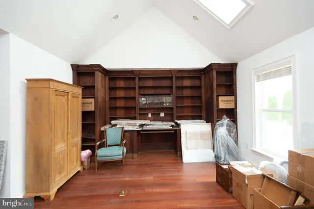 a view of a workspace with furniture